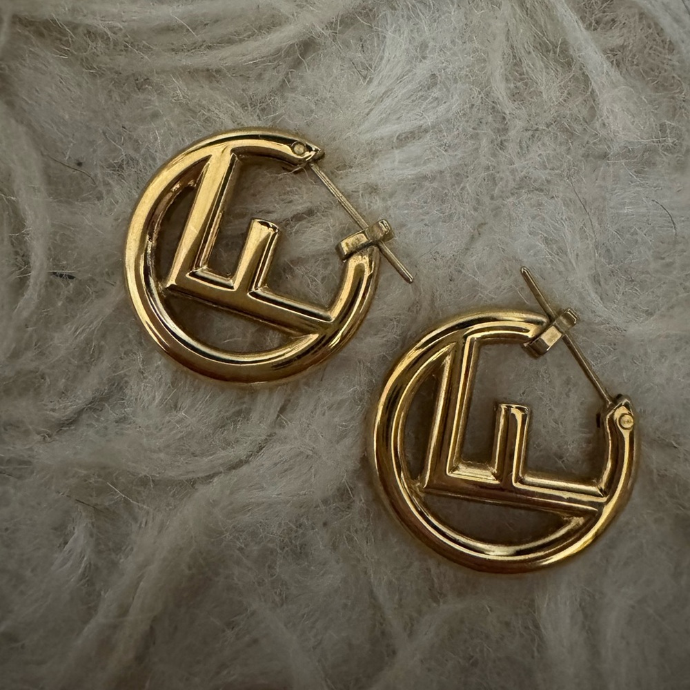 F is Fendi earrings